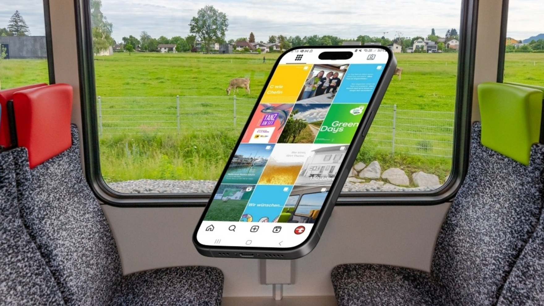Thurbo Zug mit farbigen Sitzen und Aussicht auf die Landschaft. Mockup mit einem Smartphone.